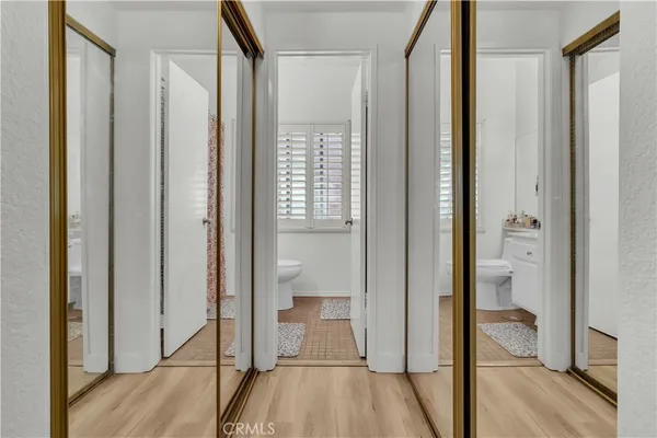 a view of a bathroom with a tub and shower