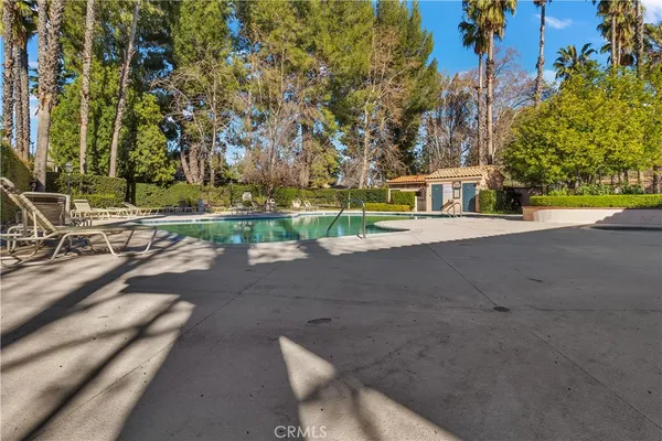 a view of a street with a bench