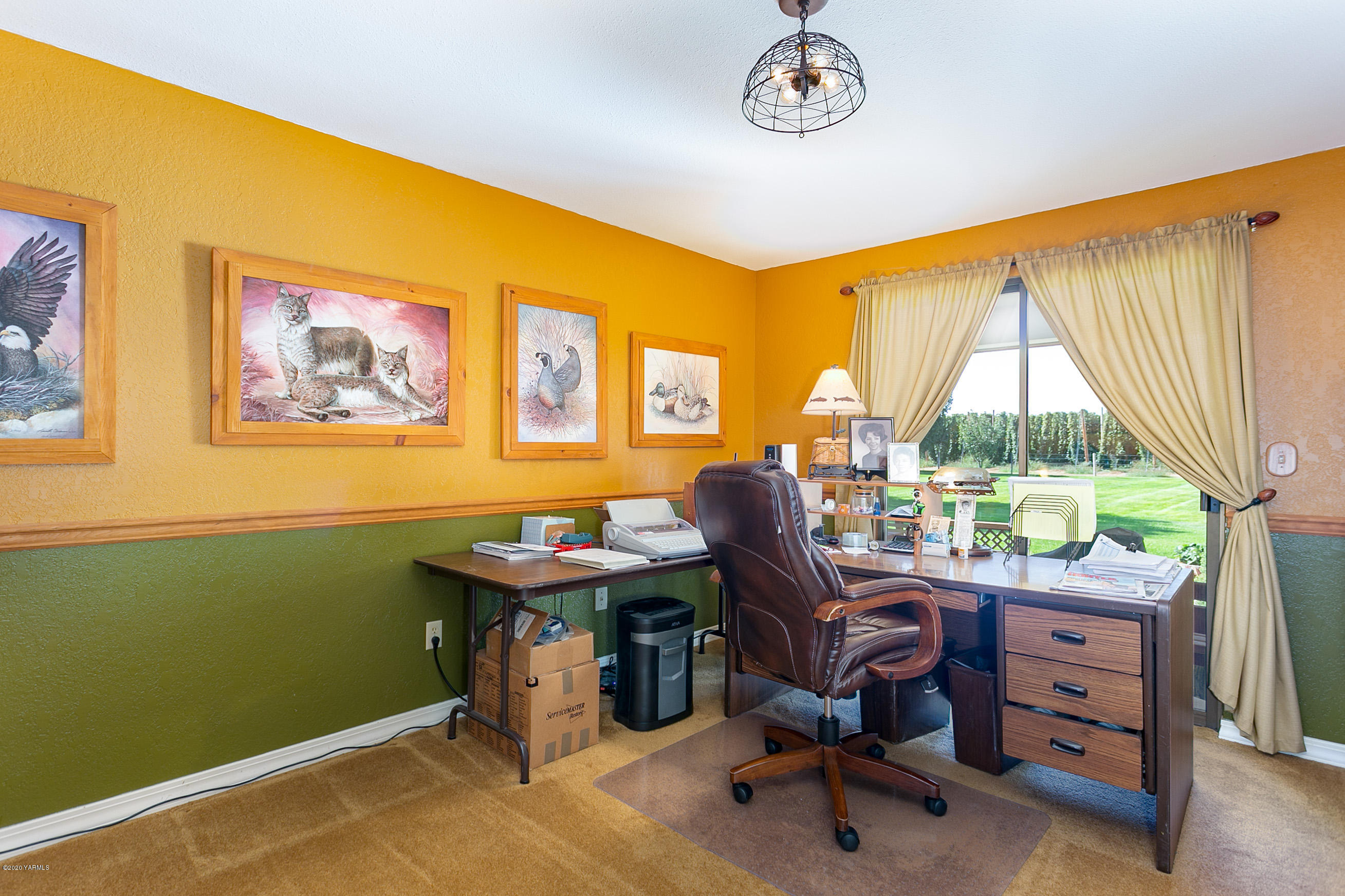 2770 South Satus Road Toppenish, WA 98948 - Photo 22 of 41 a view of a workspace with furniture and a window