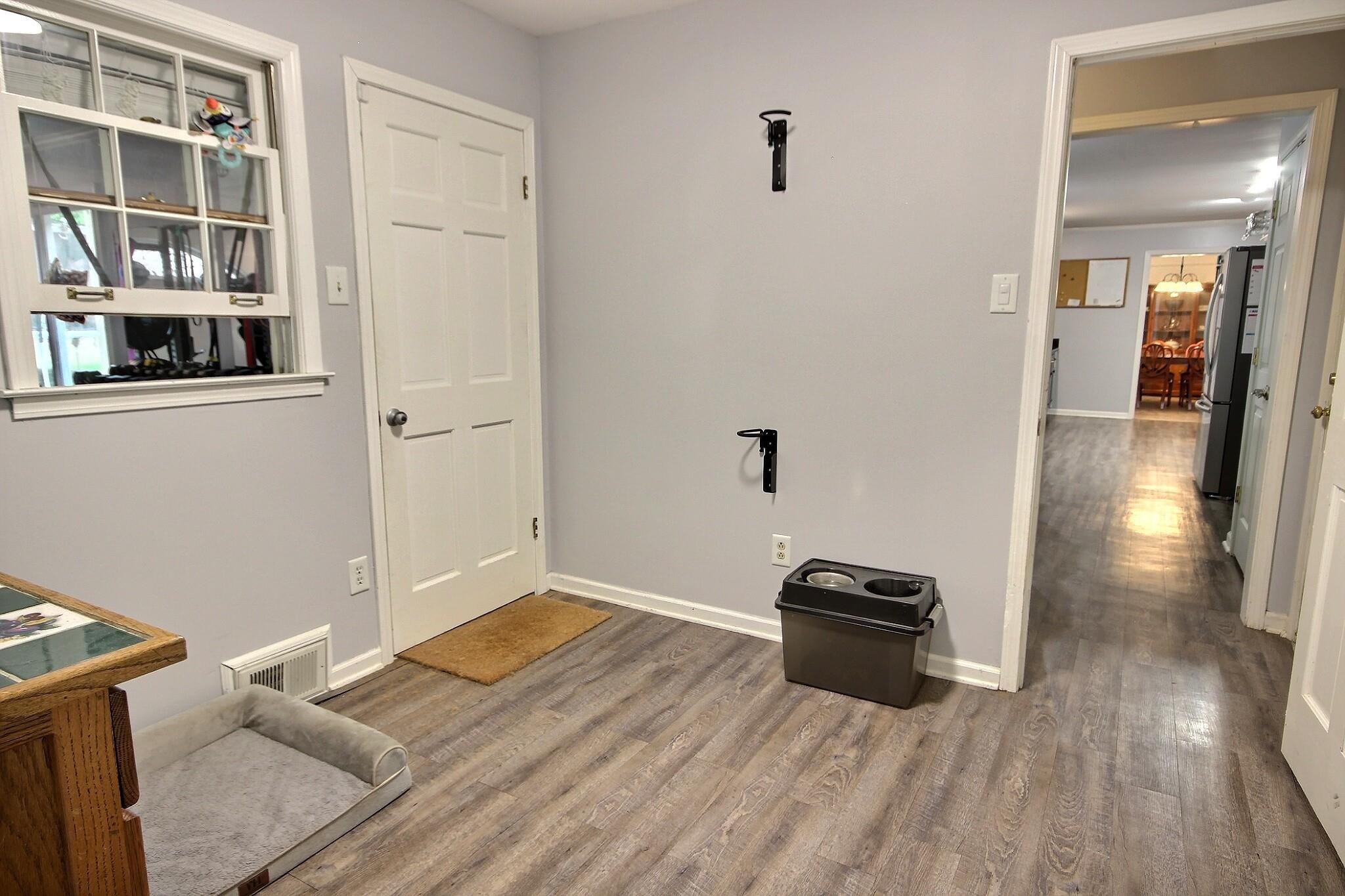 177 South Walnut Bend Road Memphis, TN 38018 - Photo 16 of 34 a view of a livingroom with wooden floor
