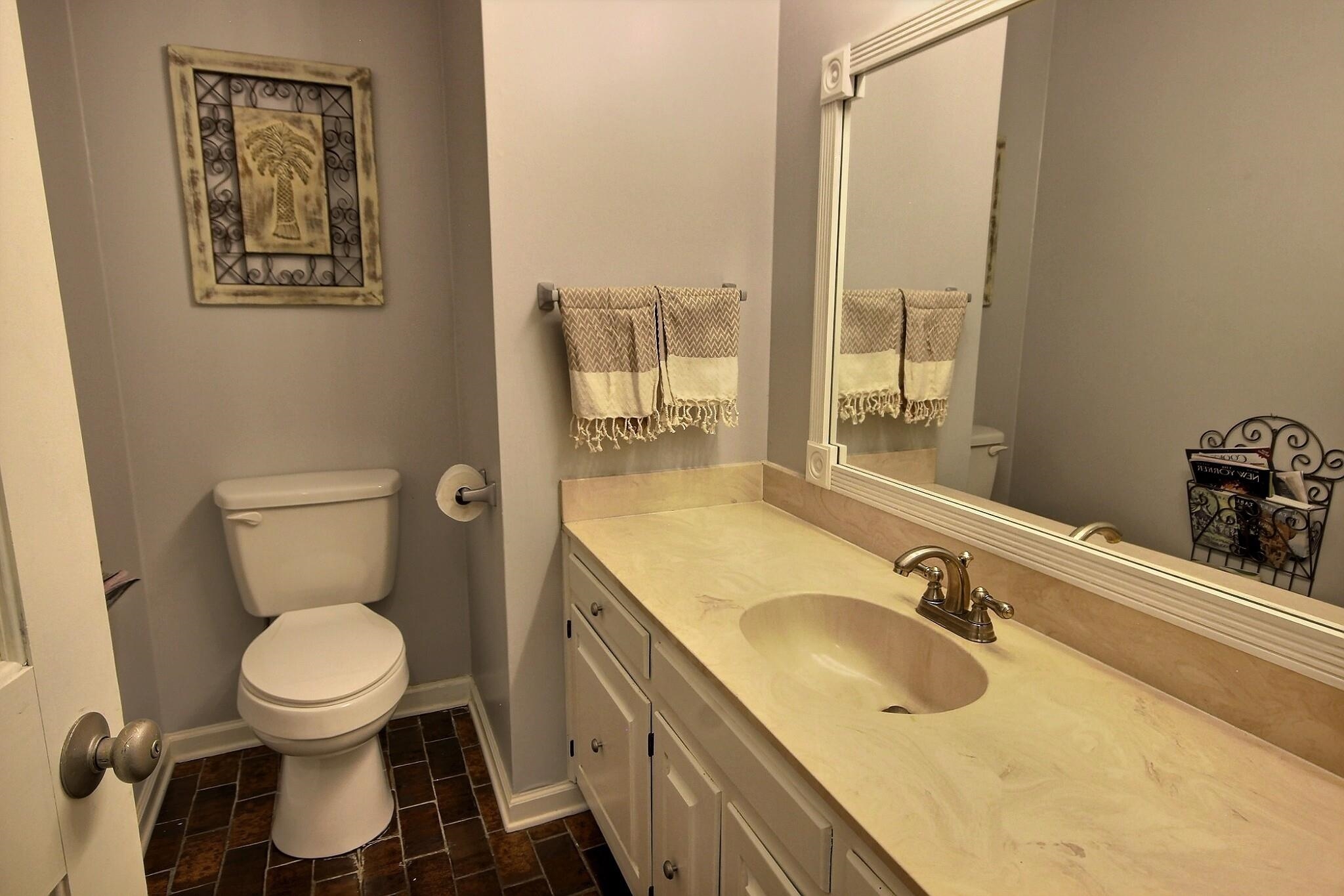 177 South Walnut Bend Road Memphis, TN 38018 - Photo 19 of 34 a bathroom with a toilet sink and mirror