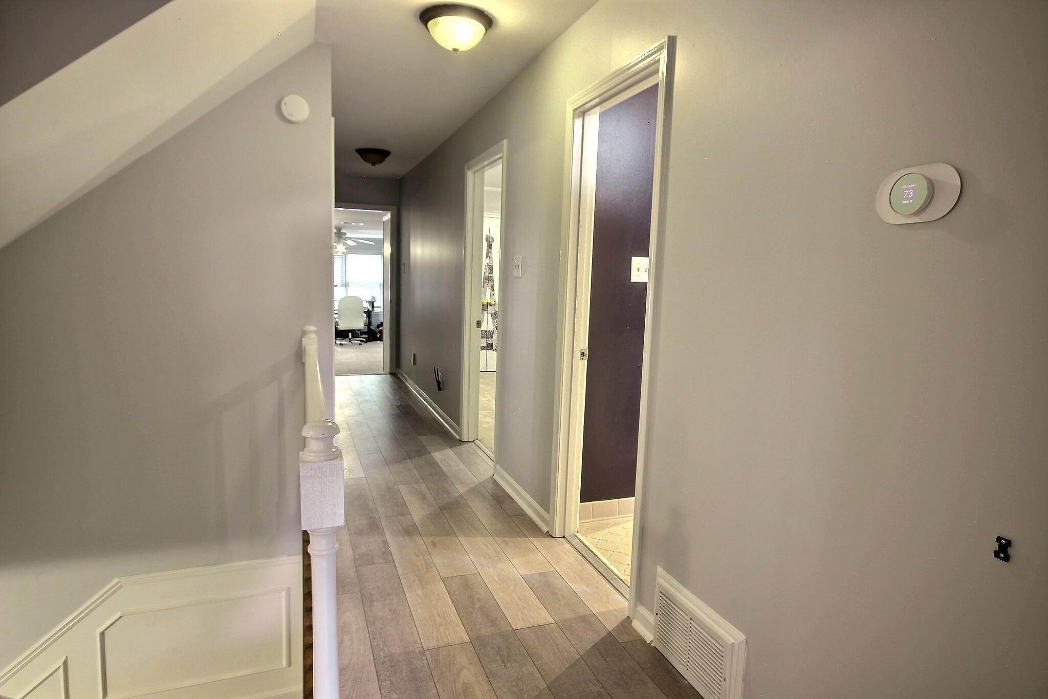 177 South Walnut Bend Road Memphis, TN 38018 - Photo 20 of 34 a view of a hallway with wooden floor