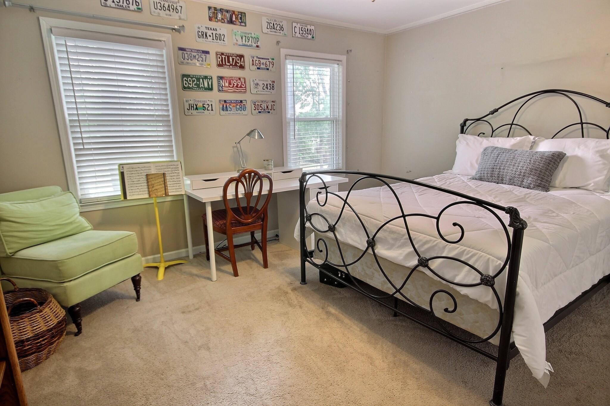 177 South Walnut Bend Road Memphis, TN 38018 - Photo 28 of 34 a bedroom with a bed and a chair