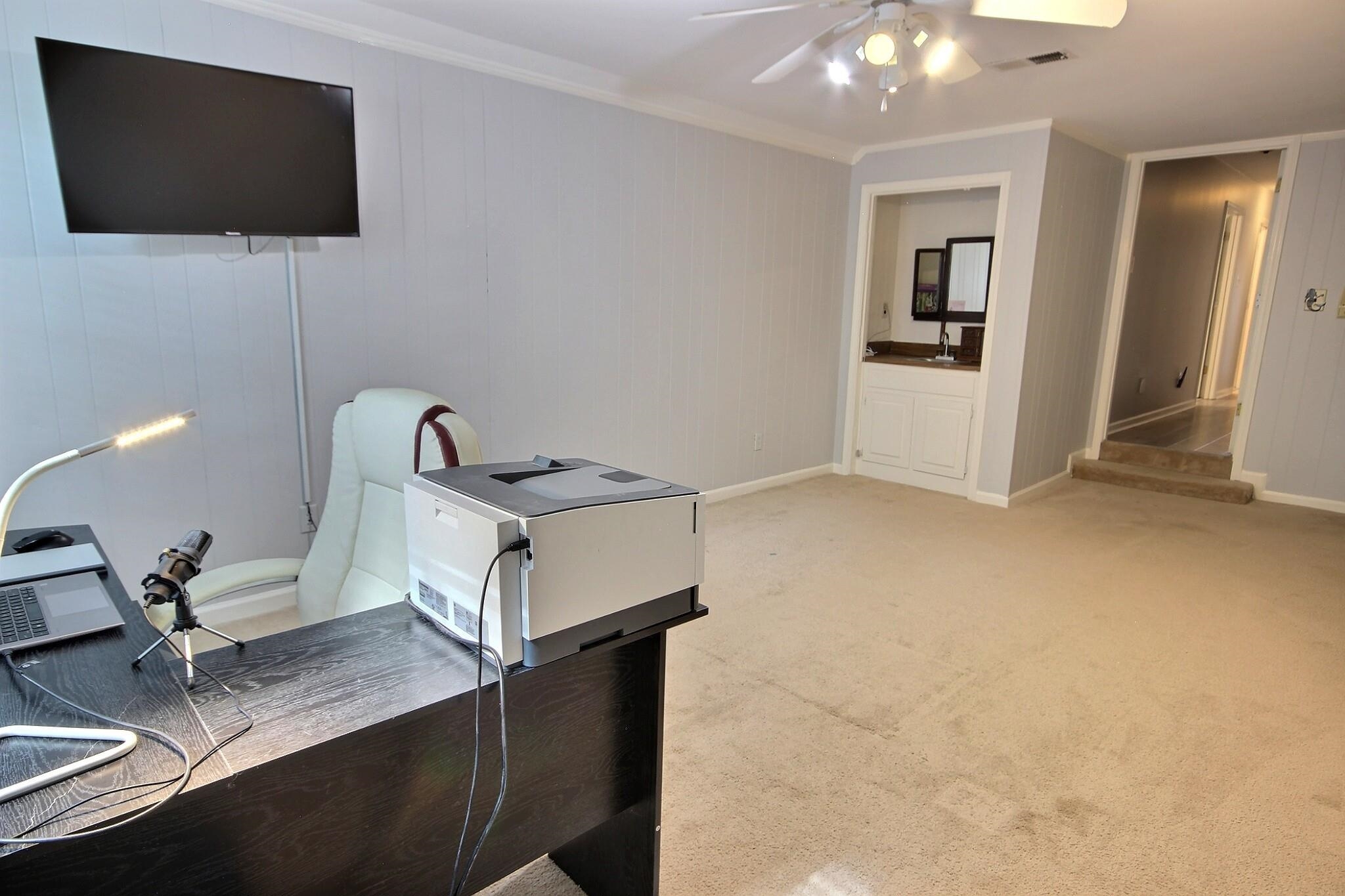 177 South Walnut Bend Road Memphis, TN 38018 - Photo 30 of 34 a living room with furniture and a flat screen tv