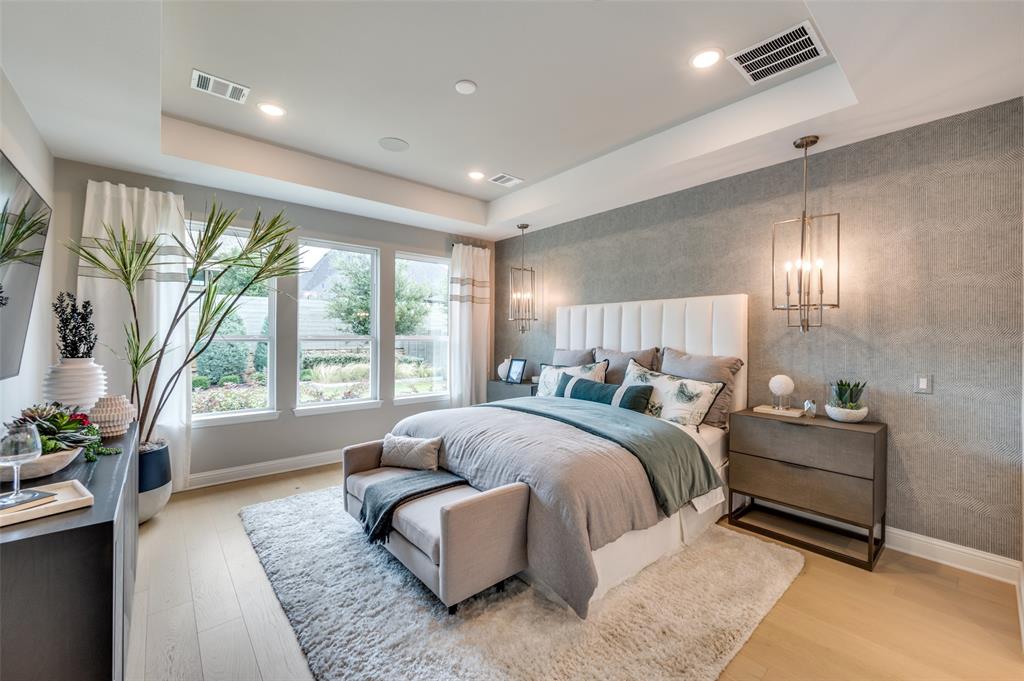 1116 Lakeview Lane Argyle, TX 76226 - Photo 12 of 40 a spacious bedroom with a bed and a couch