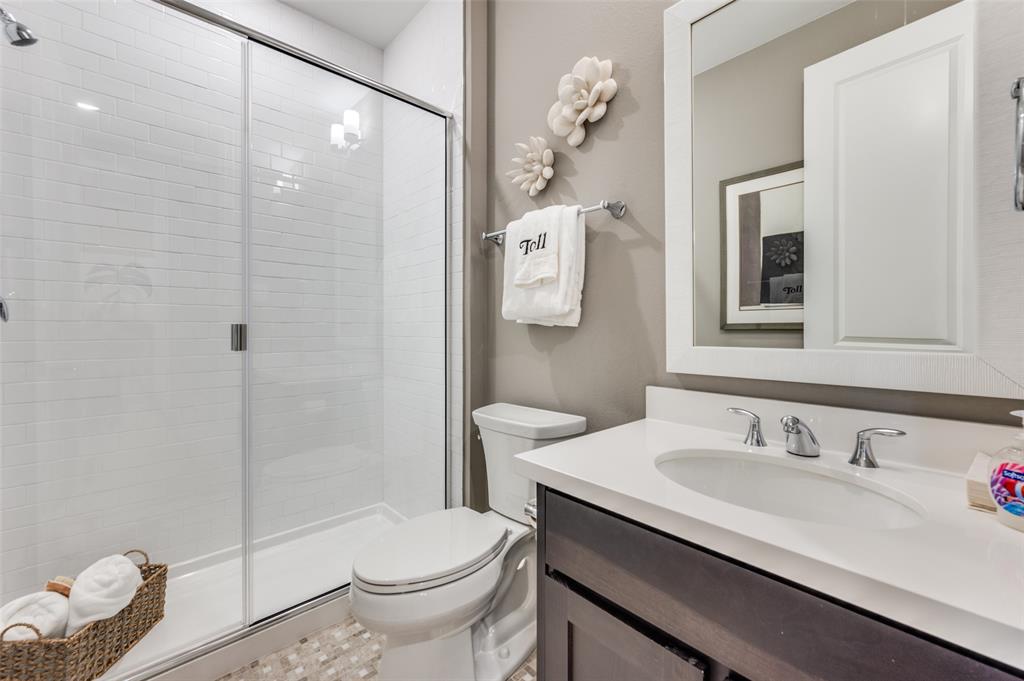 1116 Lakeview Lane Argyle, TX 76226 - Photo 16 of 40 a bathroom with a sink toilet and shower