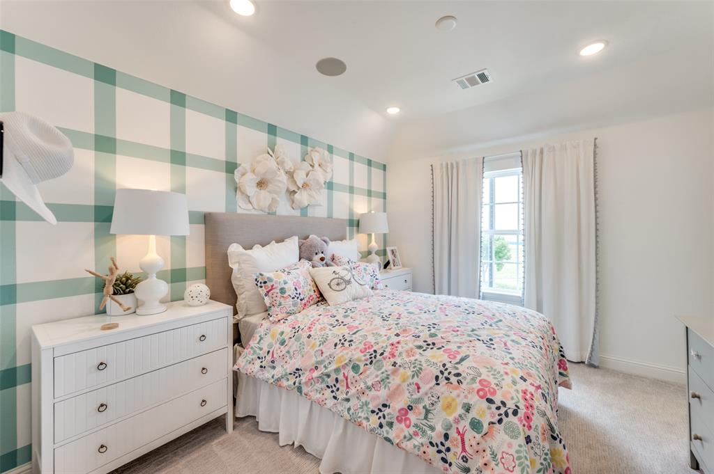 1116 Lakeview Lane Argyle, TX 76226 - Photo 17 of 40 a bedroom with a large bed and a large mirror