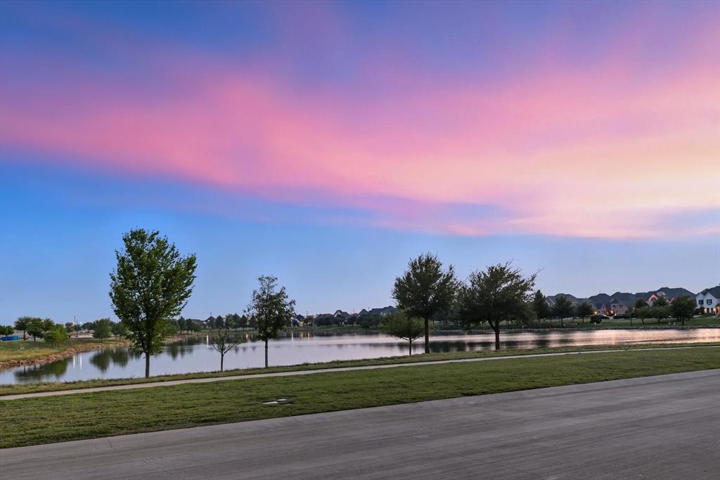 1116 Lakeview Lane Argyle, TX 76226 - Photo 2 of 40 a view of a playground and a lake