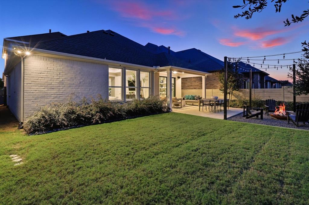 1116 Lakeview Lane Argyle, TX 76226 - Photo 26 of 40 a view of a house with backyard and porch