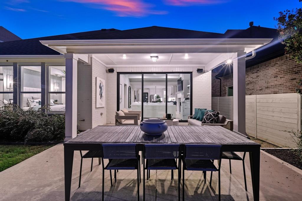 1116 Lakeview Lane Argyle, TX 76226 - Photo 28 of 40 a view of a patio with table and chairs