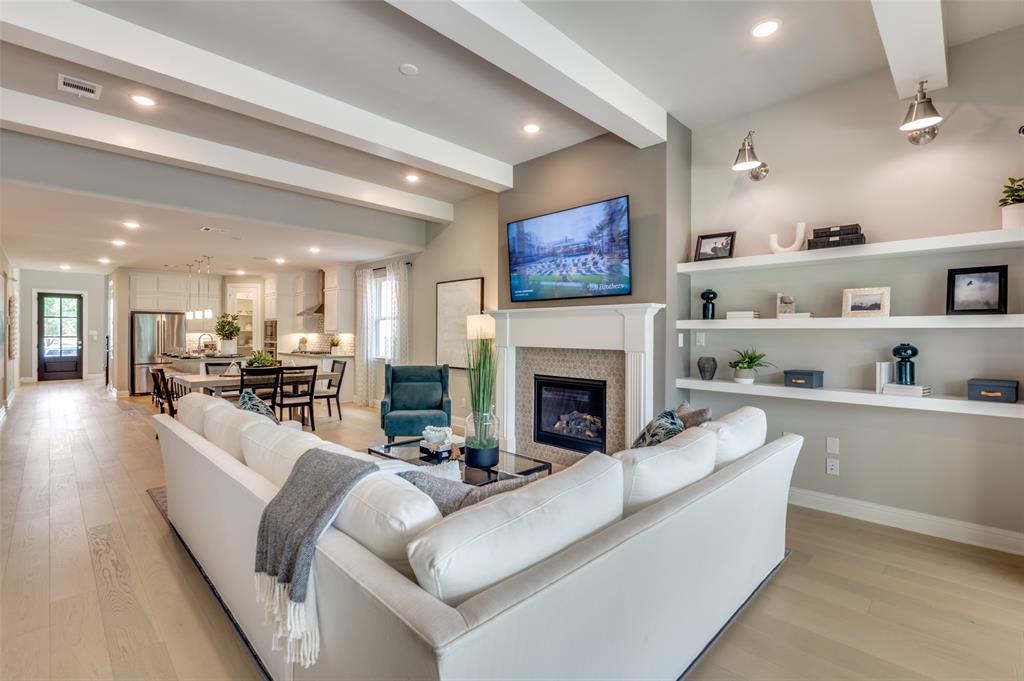 1116 Lakeview Lane Argyle, TX 76226 - Photo 7 of 40 a living room with furniture fireplace and kitchen view