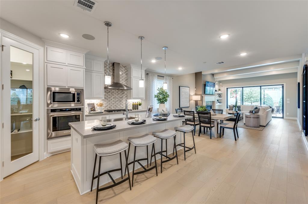 1116 Lakeview Lane Argyle, TX 76226 - Photo 8 of 40 a kitchen with lots of counter top space and stainless steel appliances