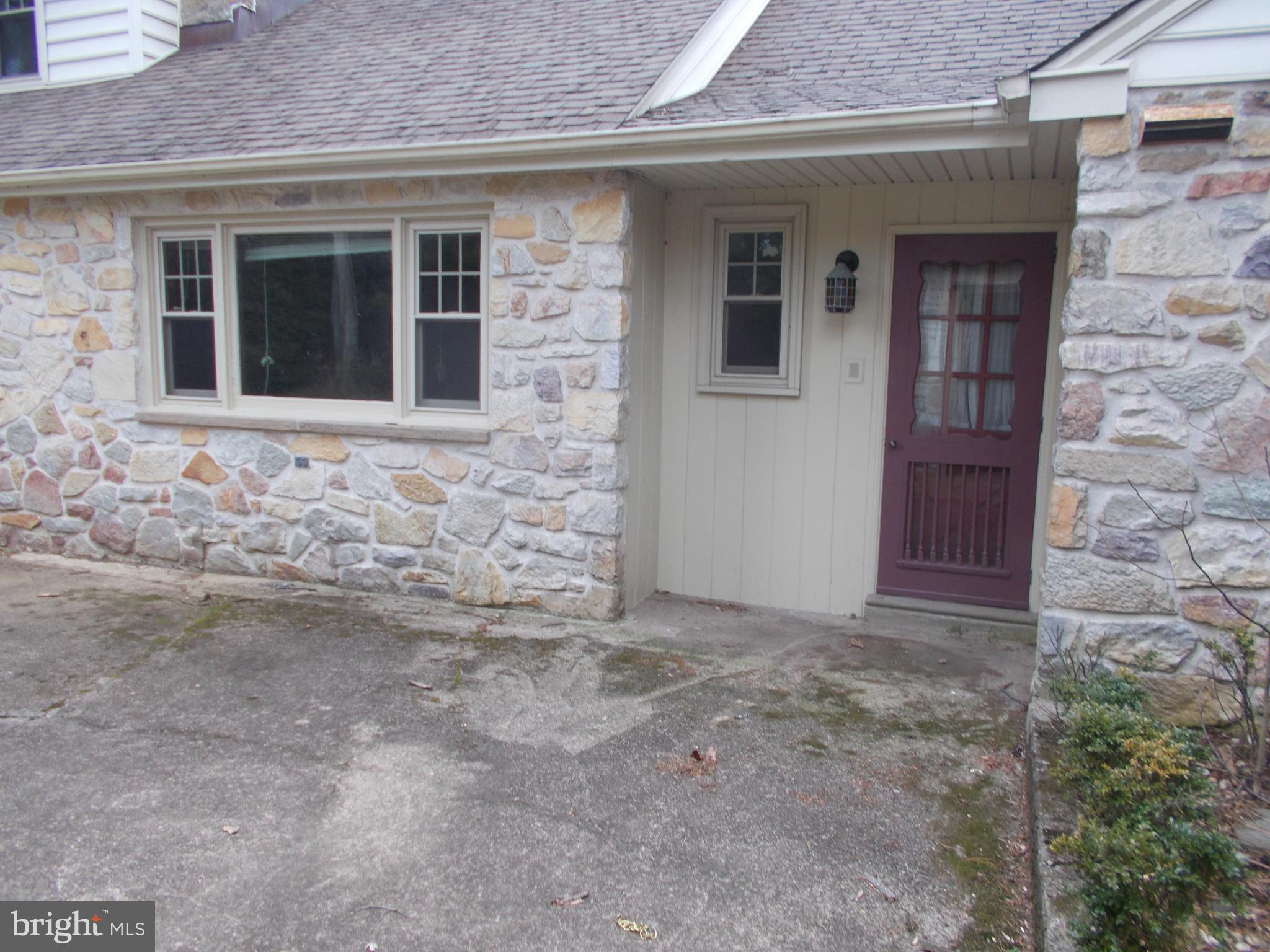 830 Gregory Road Jenkintown, PA 19046 - Photo 4 of 35 close up view of rear foyer exit to garage and pat
