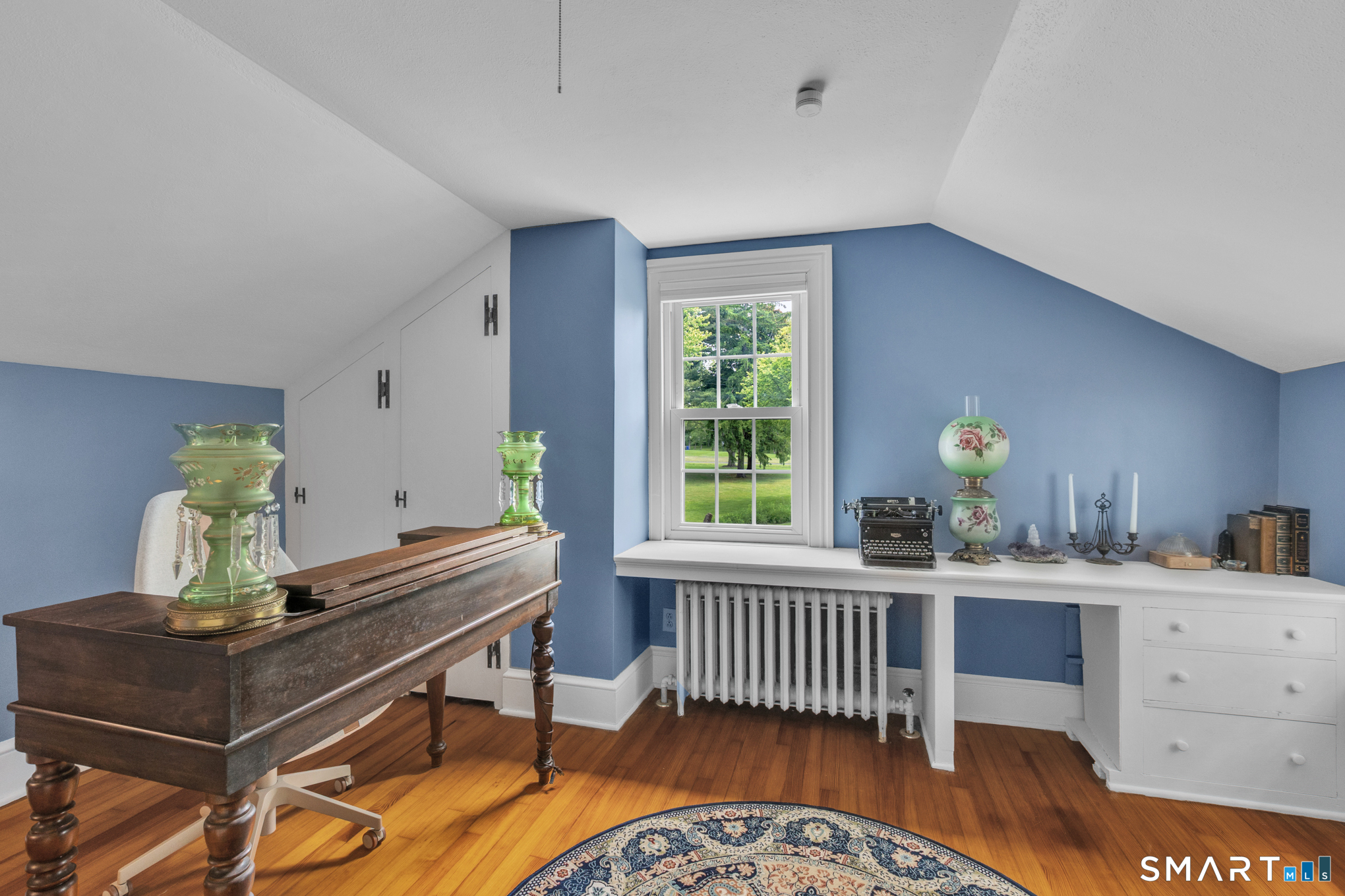 808 Branch Road Suffield, CT 06078 - Photo 26 of 40 a room with a table chair and a window