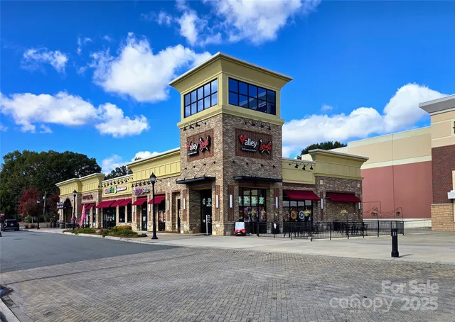 a view of street with shops