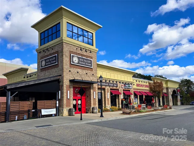 a front view of a building with street