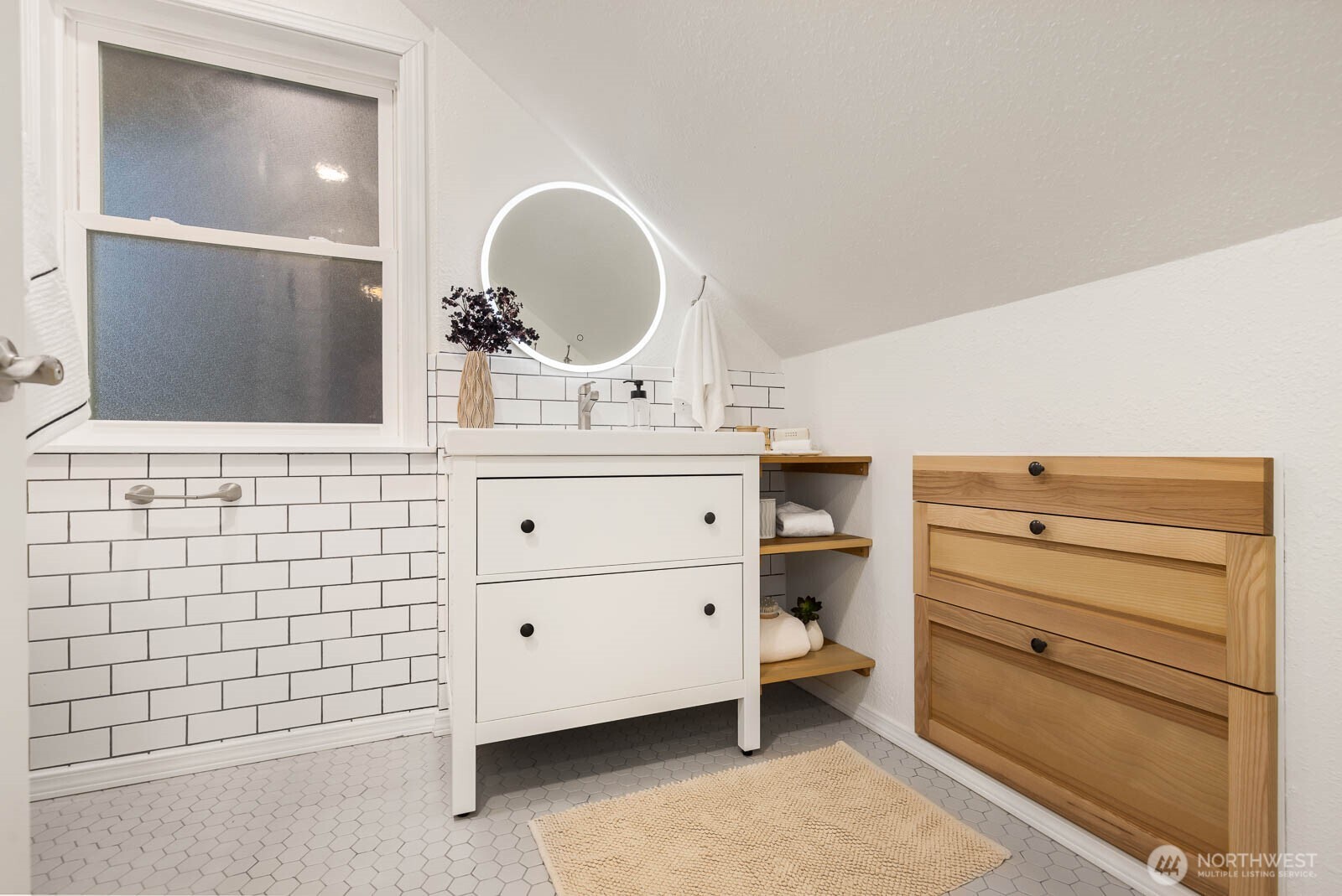 17110 66th Place West Edmonds, WA 98026 - Photo 17 of 38 a room with a cabinets and a mirror on dresser