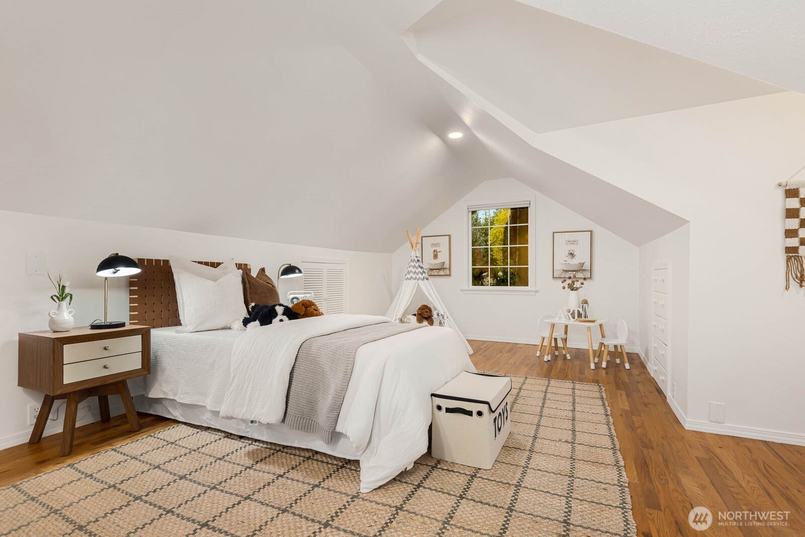 17110 66th Place West Edmonds, WA 98026 - Photo 19 of 38 a bedroom with a bed and a window