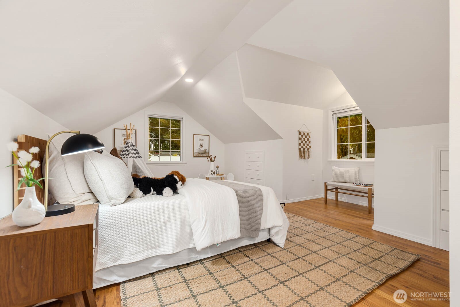 17110 66th Place West Edmonds, WA 98026 - Photo 20 of 38 a bedroom with a bed and wooden floor