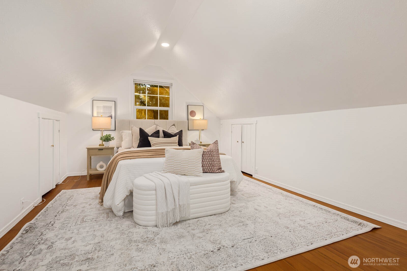 17110 66th Place West Edmonds, WA 98026 - Photo 22 of 38 a bedroom with a bed and a window