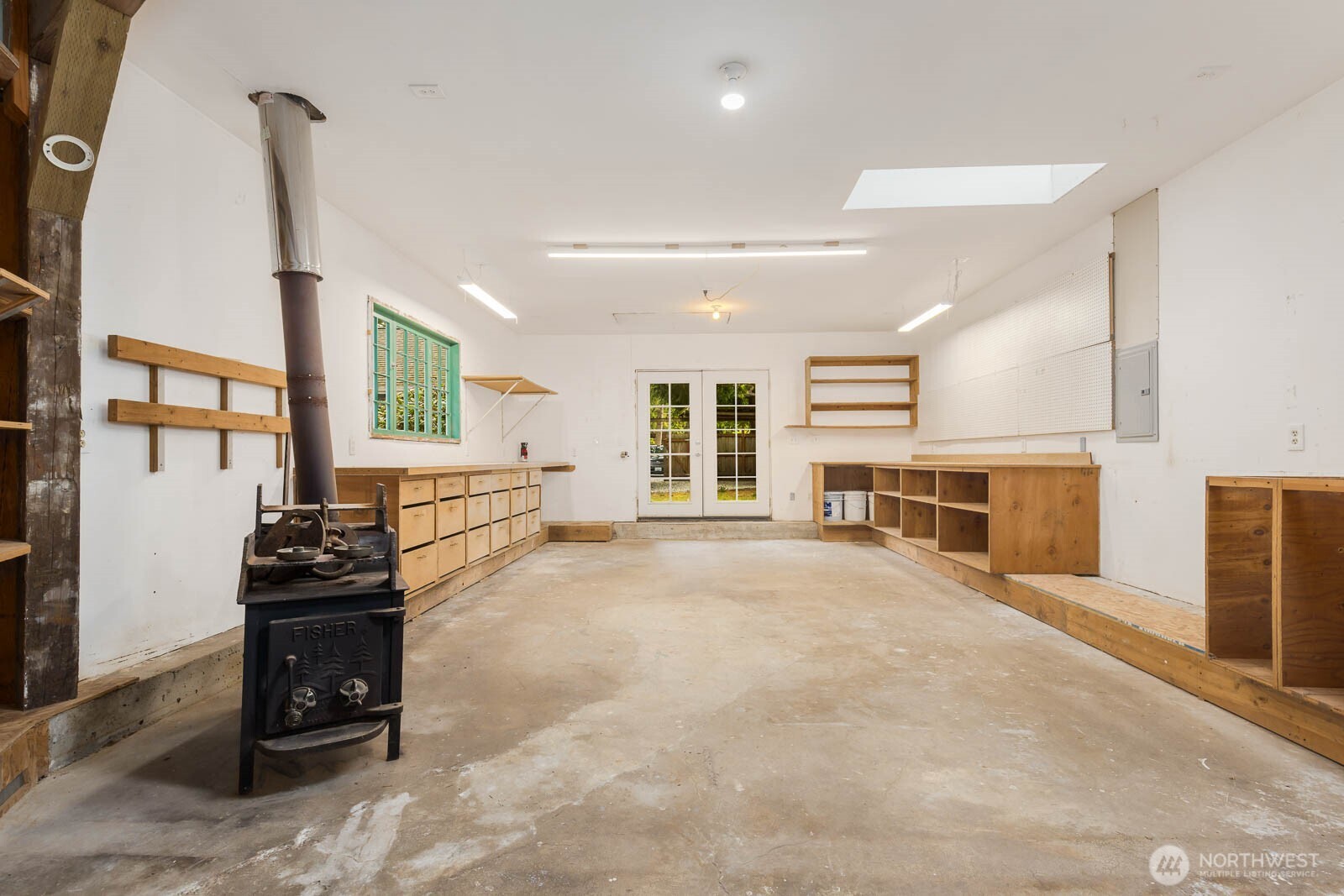 17110 66th Place West Edmonds, WA 98026 - Photo 29 of 38 a living room with furniture and a flat screen tv