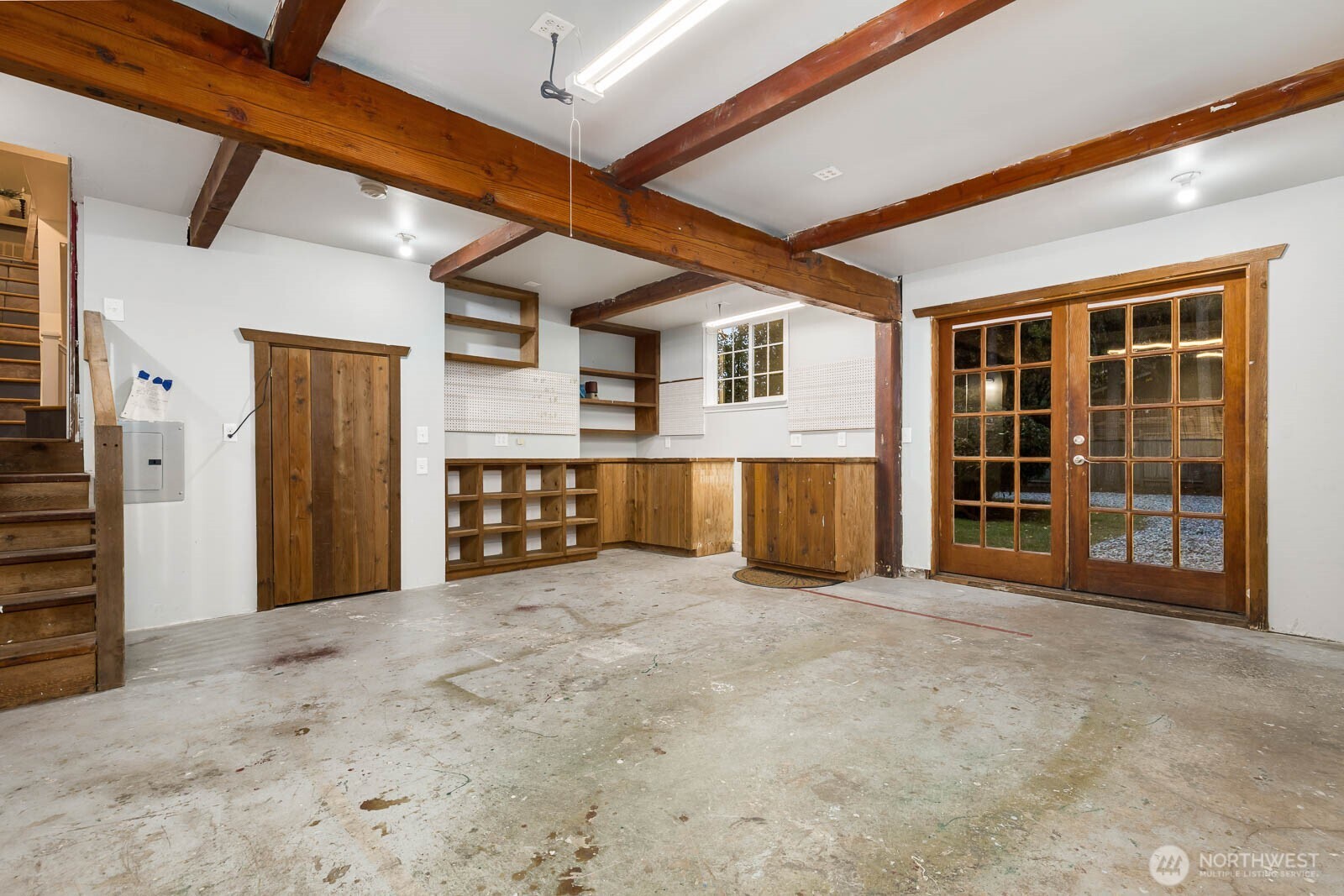 17110 66th Place West Edmonds, WA 98026 - Photo 32 of 38 a view of an empty room with a fireplace and entryway
