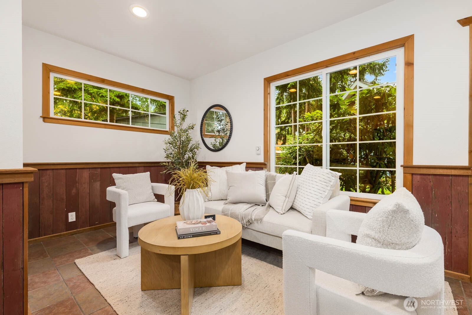 17110 66th Place West Edmonds, WA 98026 - Photo 33 of 38 a living room with furniture and a large window