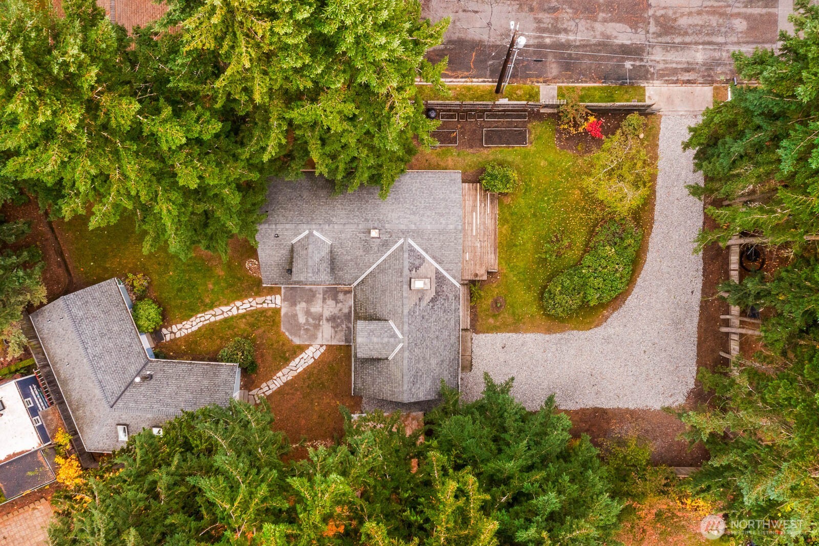 17110 66th Place West Edmonds, WA 98026 - Photo 38 of 38 an aerial view of a house with garden space and a fountain
