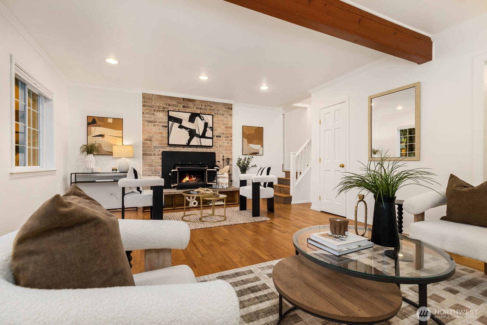 17110 66th Place West Edmonds, WA 98026 - Photo 5 of 38 a living room with furniture potted plant and a fireplace