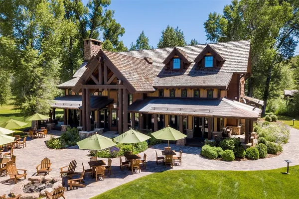 a view of a cafe with sitting area
