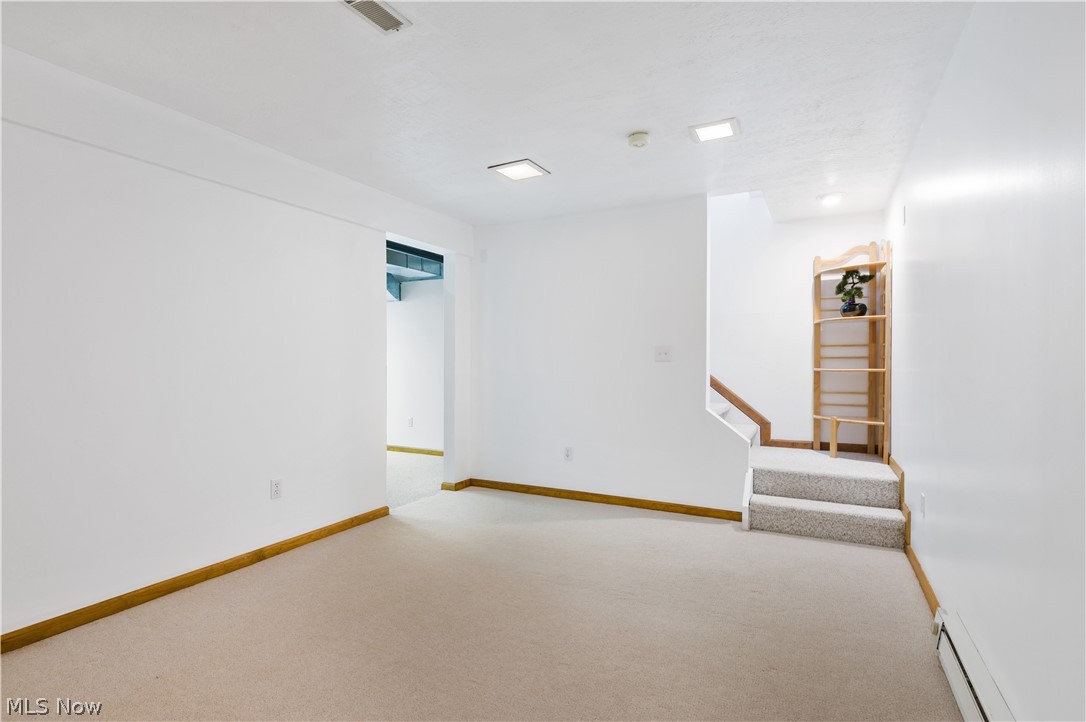 828 Bridge Road Akron, OH 44312 - Photo 23 of 35 Partially Finished Lower Level 1st rec rm