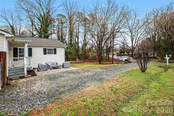 a house view with a backyard space