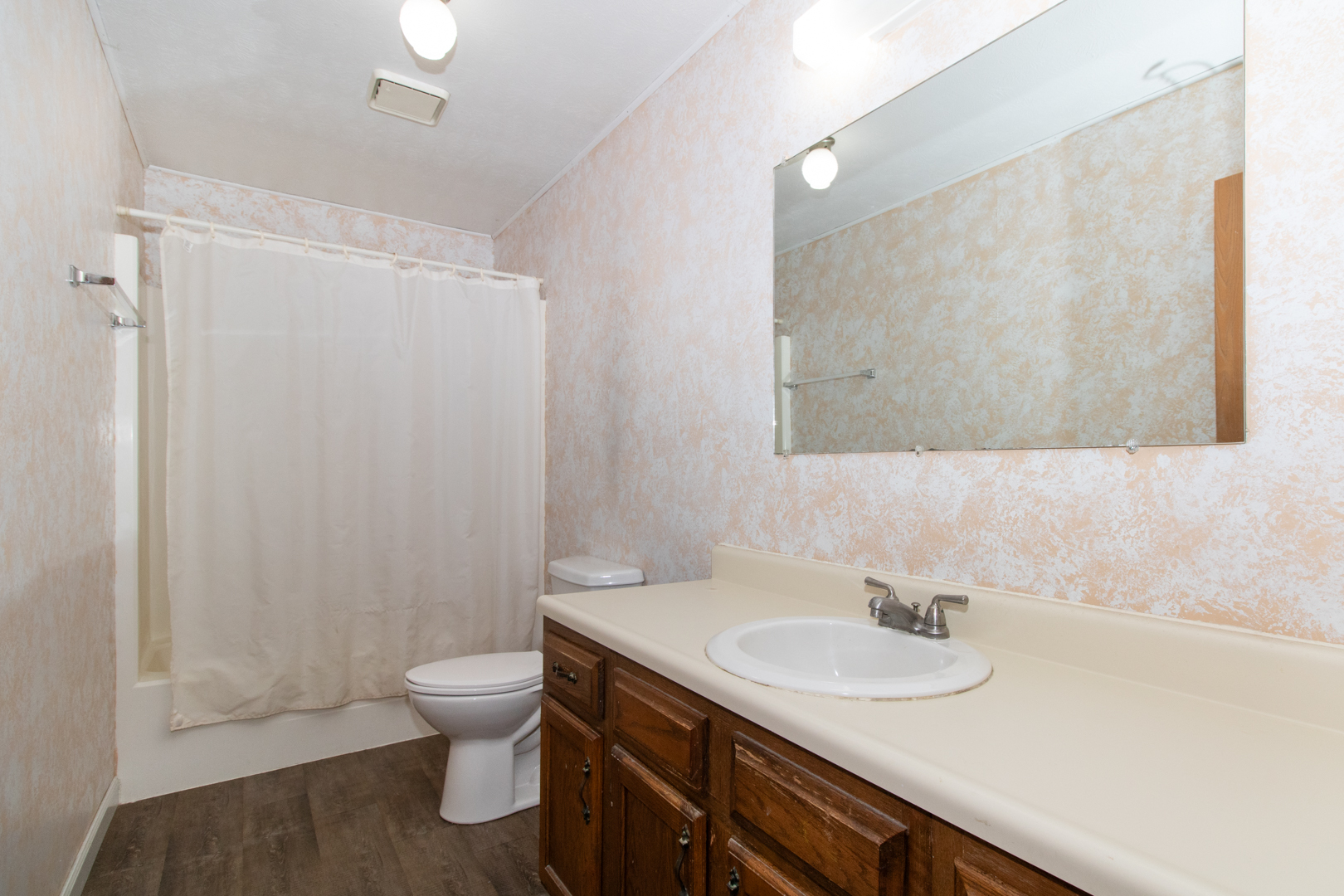 105 Churchill Road Normal, IL 61761 - Photo 12 of 24 a bathroom with a granite countertop sink toilet and shower
