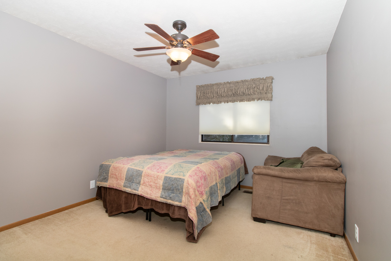 105 Churchill Road Normal, IL 61761 - Photo 19 of 24 a bedroom with a bed and window