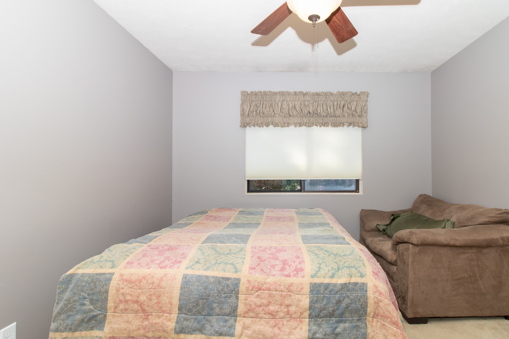 105 Churchill Road Normal, IL 61761 - Photo 20 of 24 a bedroom with a bed and a window