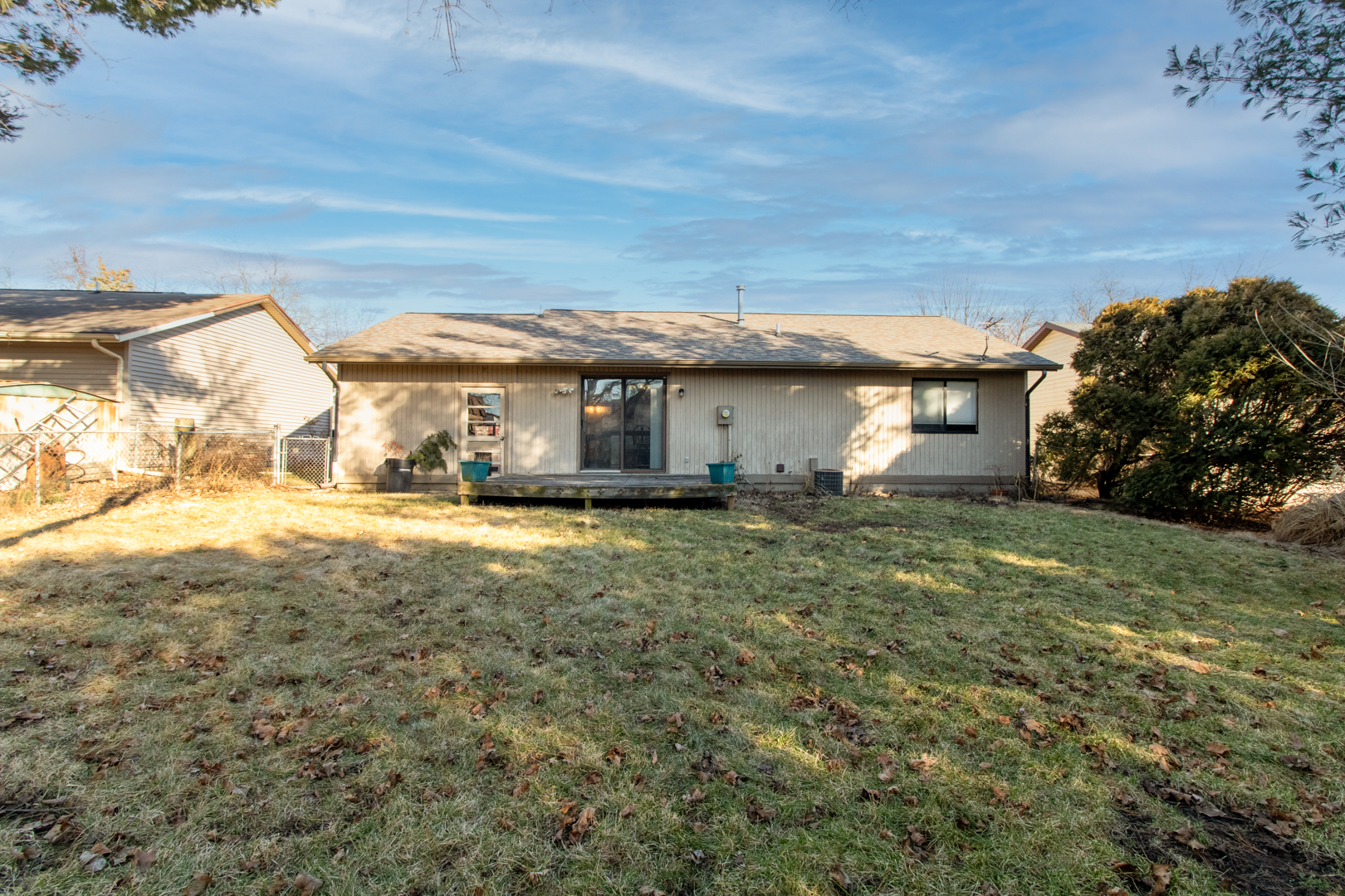 105 Churchill Road Normal, IL 61761 - Photo 23 of 24 a view of a house with backyard and garden