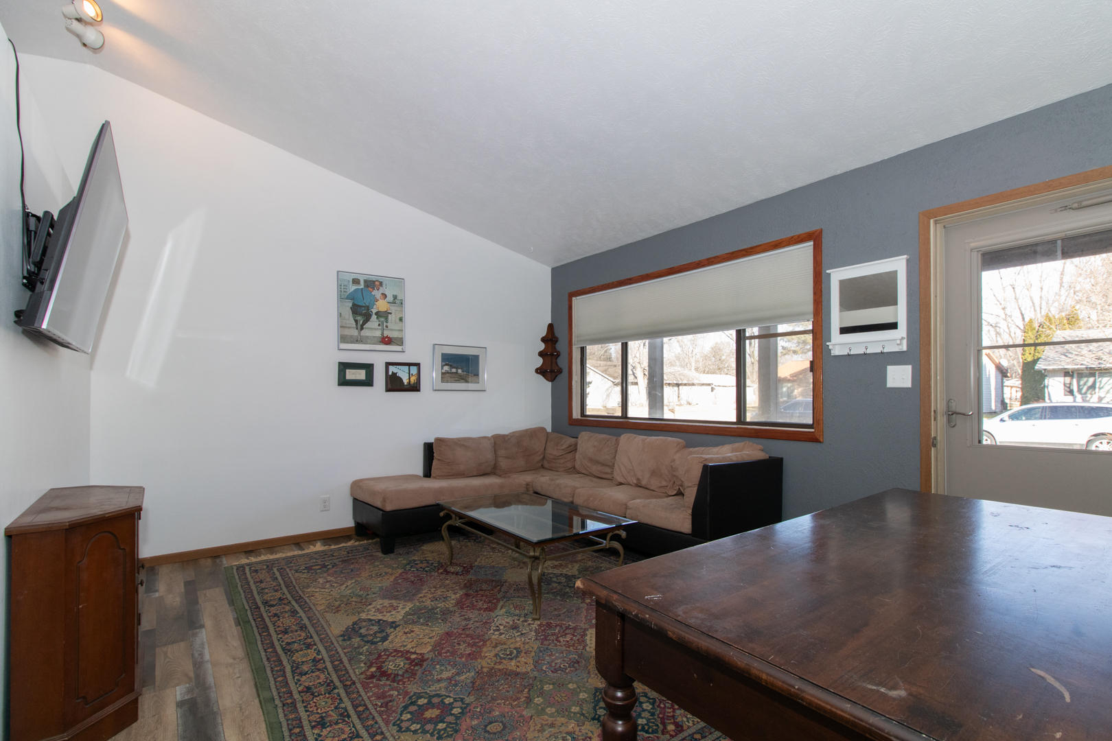 105 Churchill Road Normal, IL 61761 - Photo 3 of 24 a living room with furniture and a flat screen tv