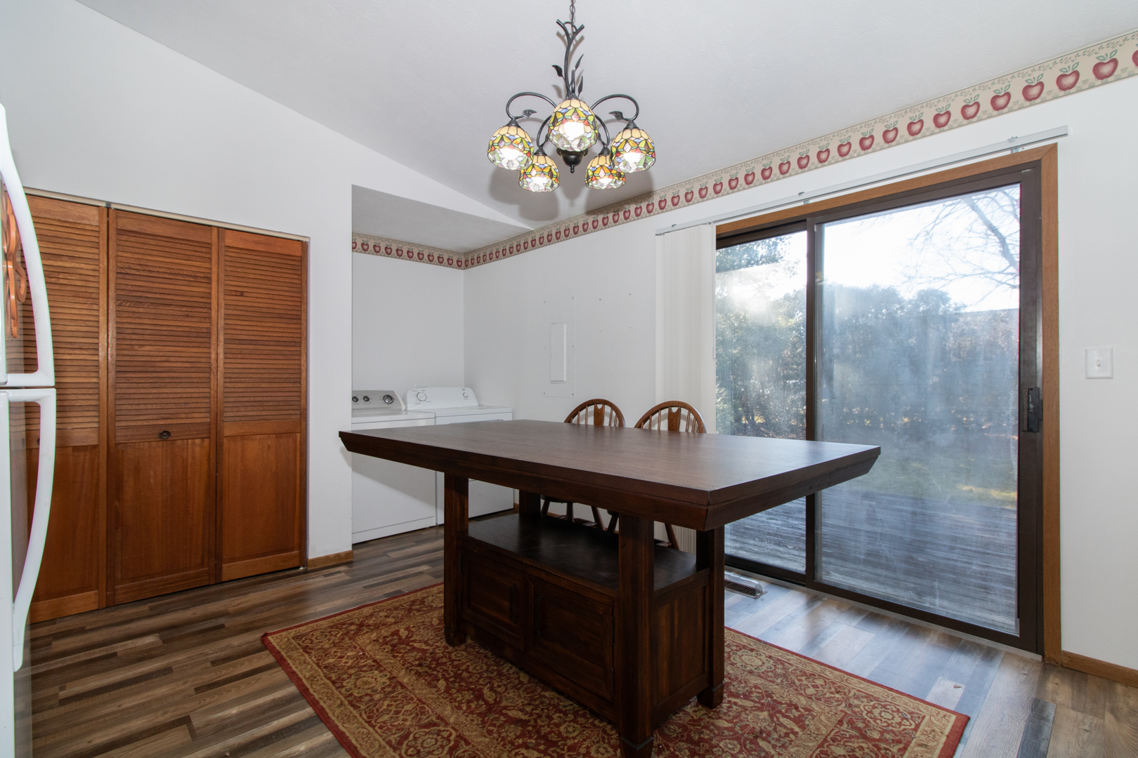 105 Churchill Road Normal, IL 61761 - Photo 8 of 24 a view of a room with a table and chairs
