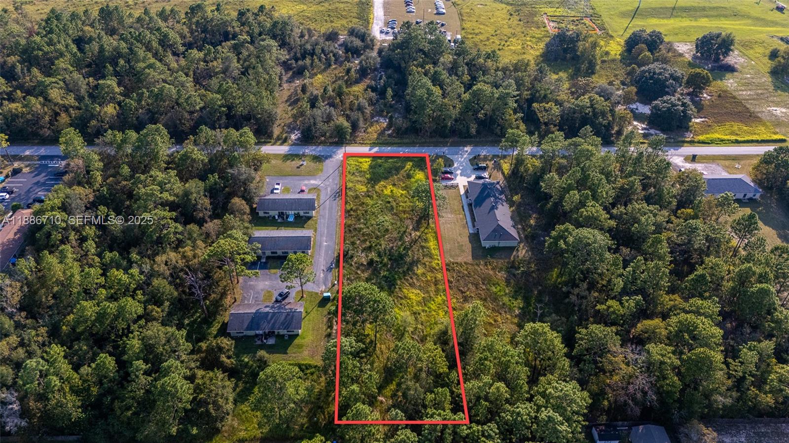 0 Midway Terrace Ocala, FL 34472 - Photo 6 of 8 an aerial view of house with yard and swimming pool