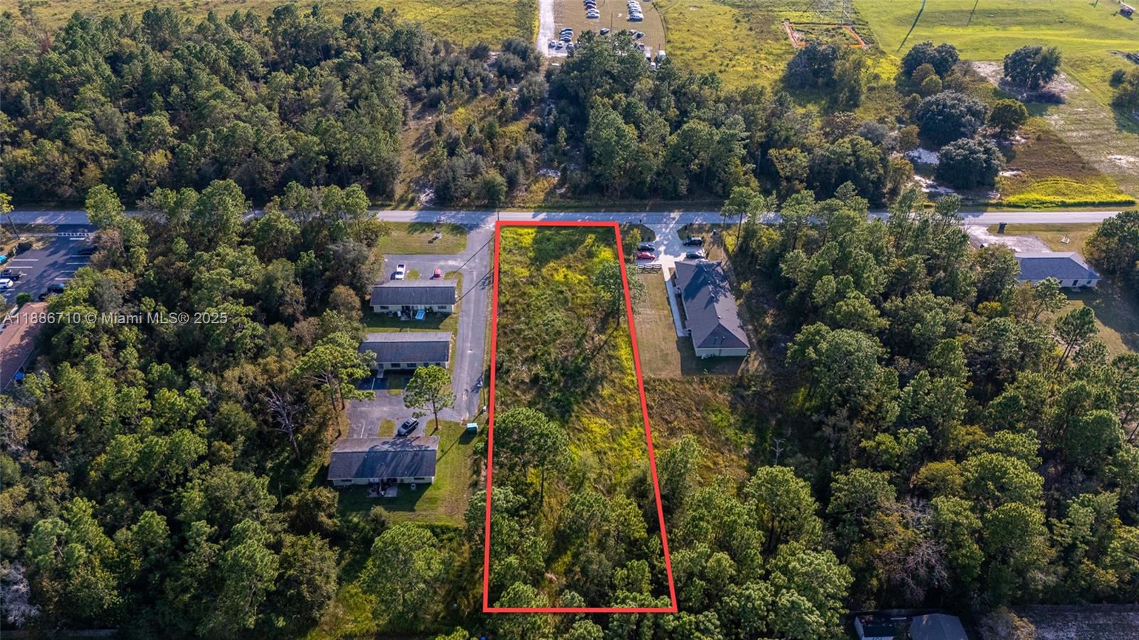 0 Midway Terrace Ocala, FL 34472 - Photo 6 of 8 an aerial view of house with yard and swimming pool