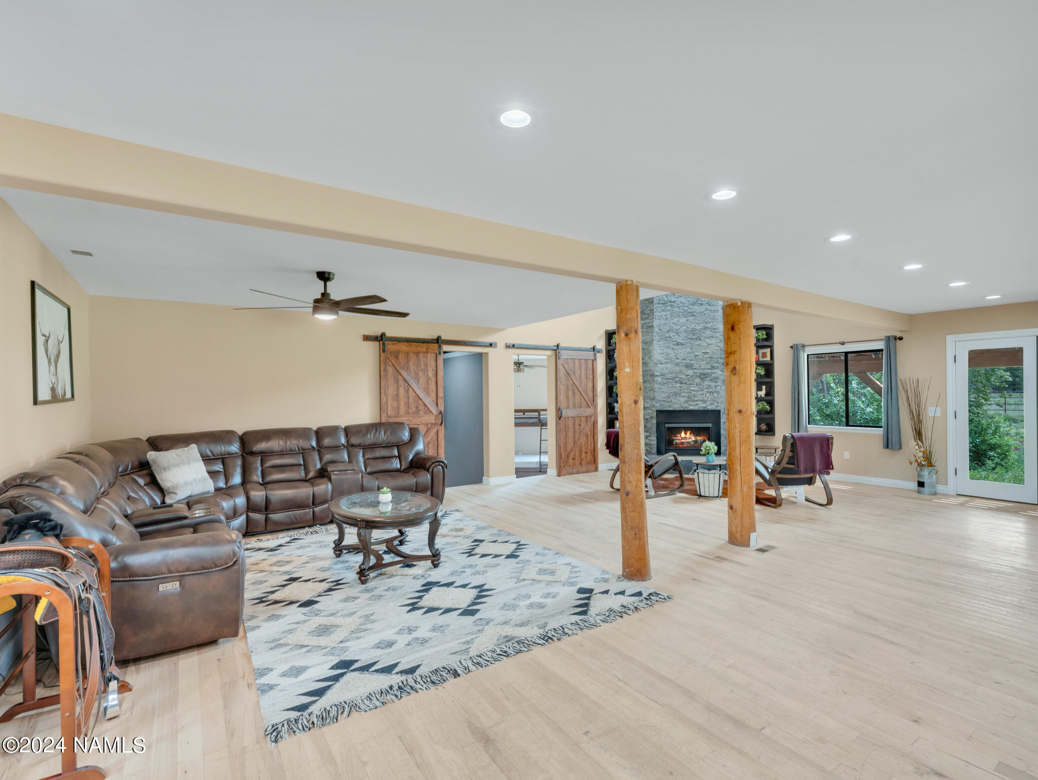 15312 Rabbit Brush Road Parks, AZ 86018 - Photo 12 of 59 a living room with furniture kitchen view and large windows