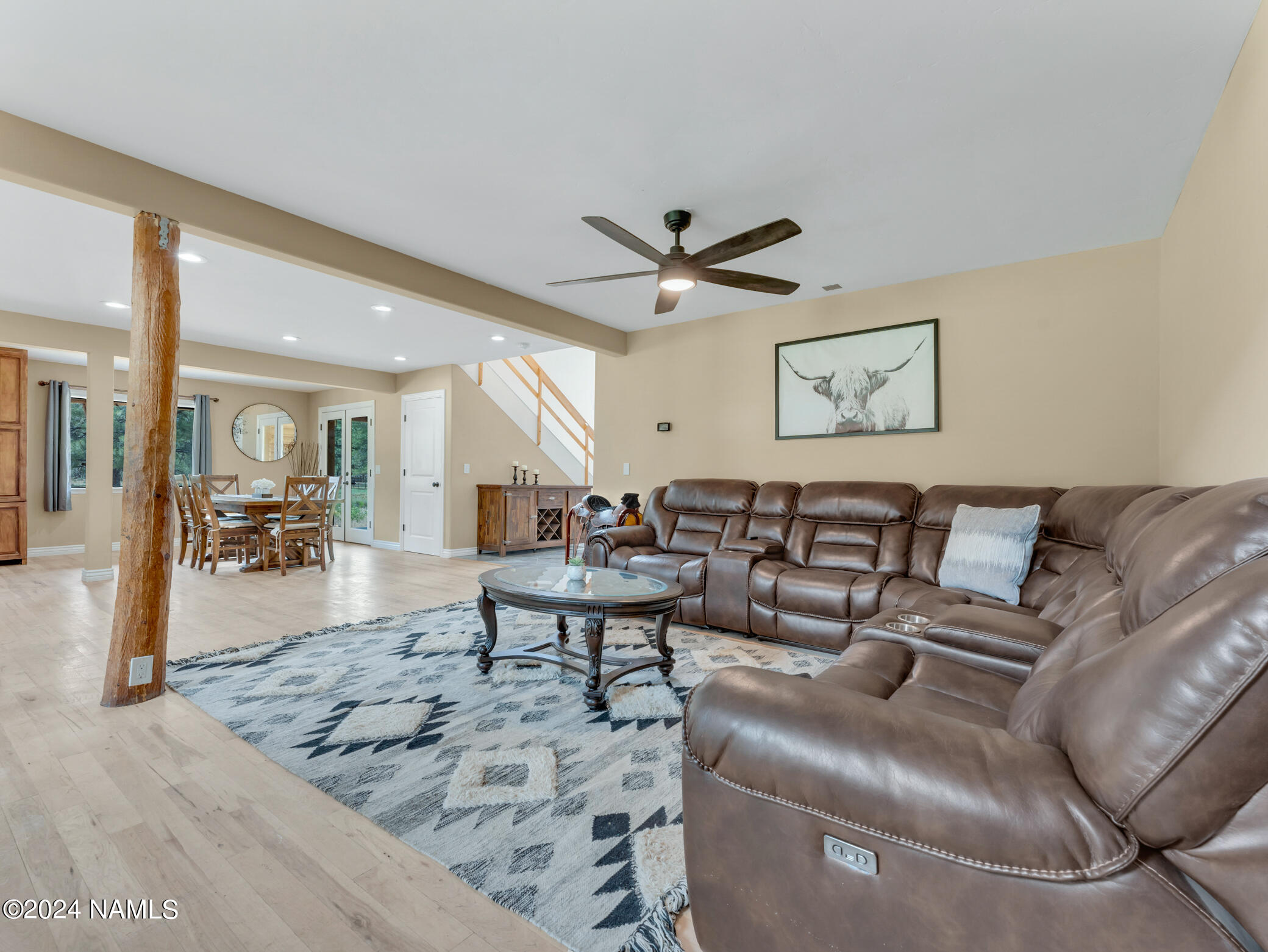 15312 Rabbit Brush Road Parks, AZ 86018 - Photo 15 of 59 a living room with furniture and a view of a living room