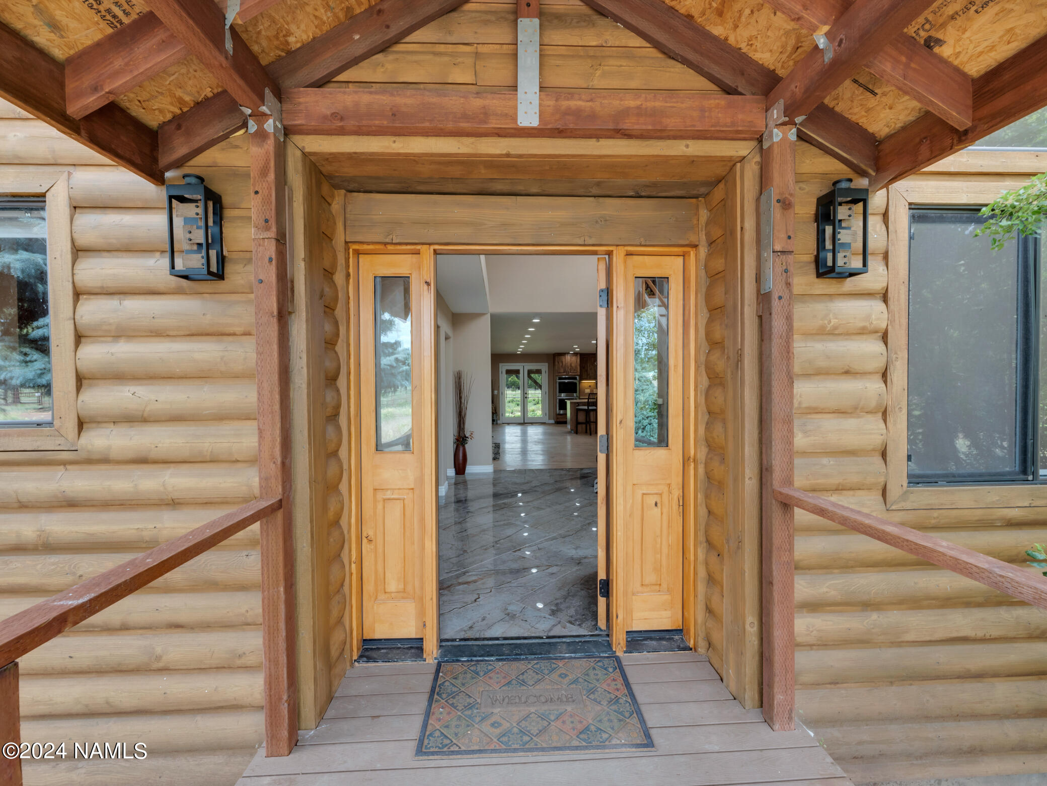 15312 Rabbit Brush Road Parks, AZ 86018 - Photo 8 of 59 a view of a entryway door front of house