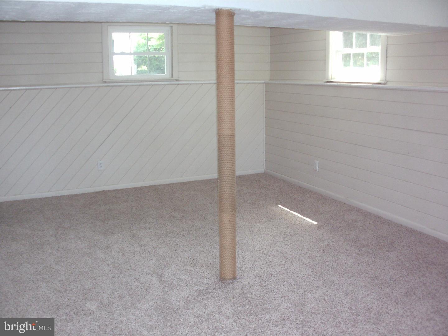 232 Oakfield Drive Newark, DE 19713 - Photo 11 of 14 an empty room with windows