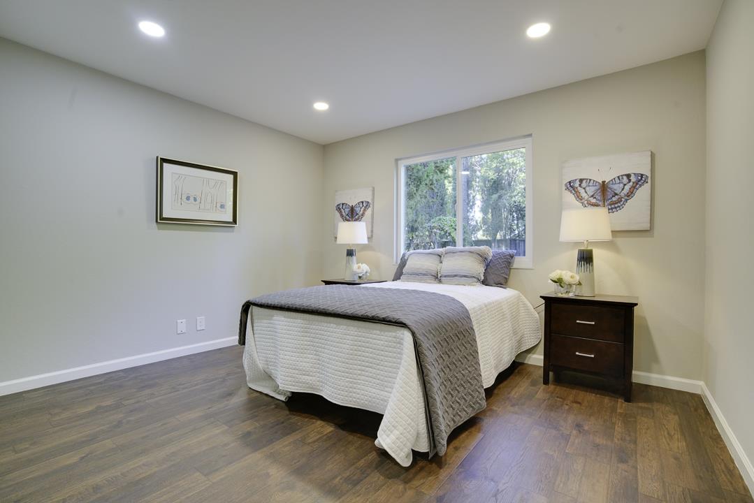 2576 Toltec Circle San Ramon, CA 94583 - Photo 14 of 37 a bedroom with a bed and a wall painting