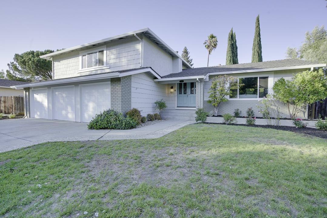 2576 Toltec Circle San Ramon, CA 94583 - Photo 34 of 37 a front view of a house with a yard and potted plants