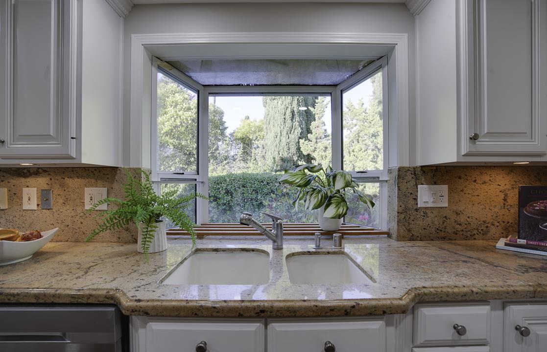 2576 Toltec Circle San Ramon, CA 94583 - Photo 10 of 37 a kitchen with granite countertop a sink a counter top space and cabinets