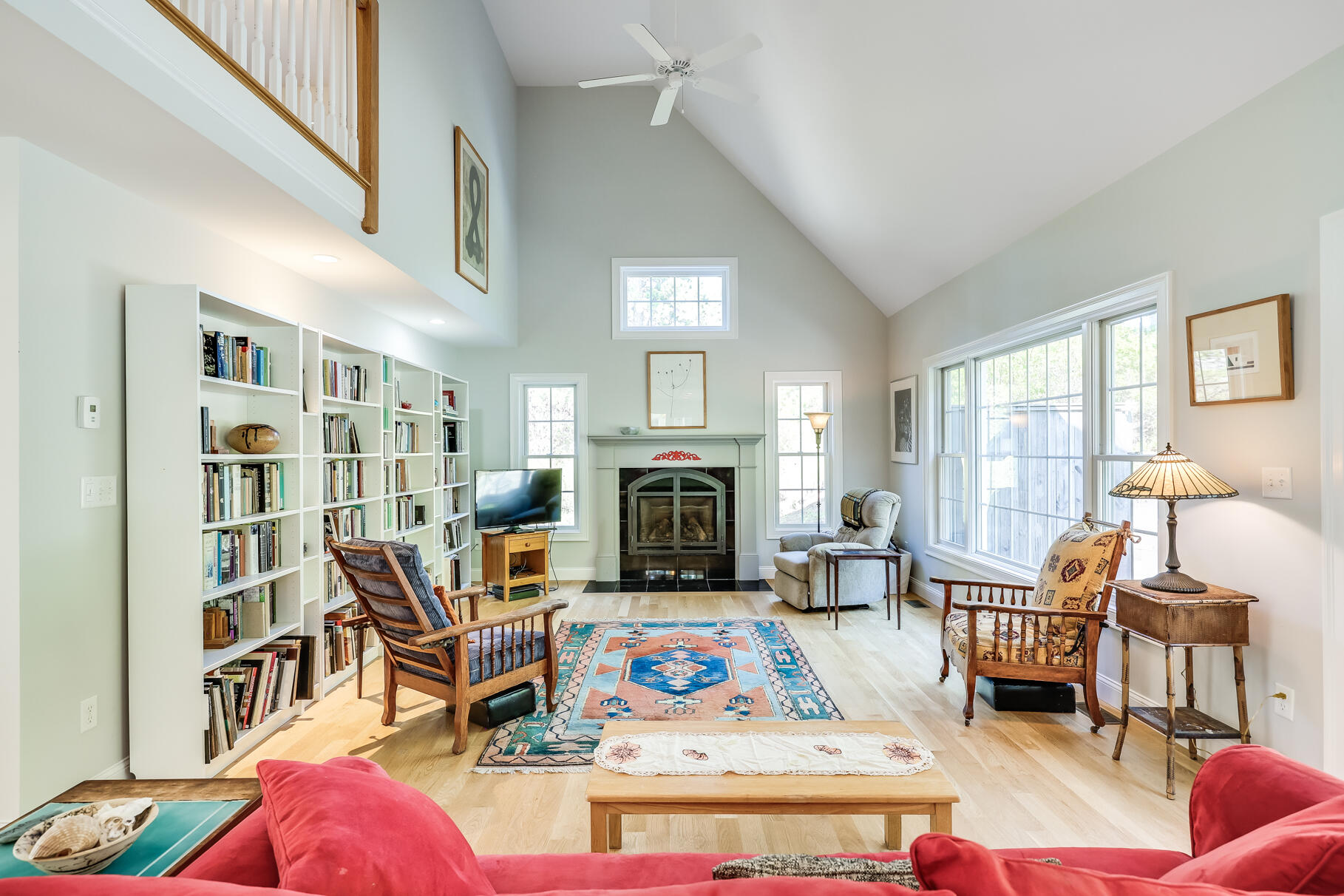 105 High Meadow Road Wellfleet, MA 02667 - Photo 20 of 52 a living room with furniture fireplace and flat screen tv