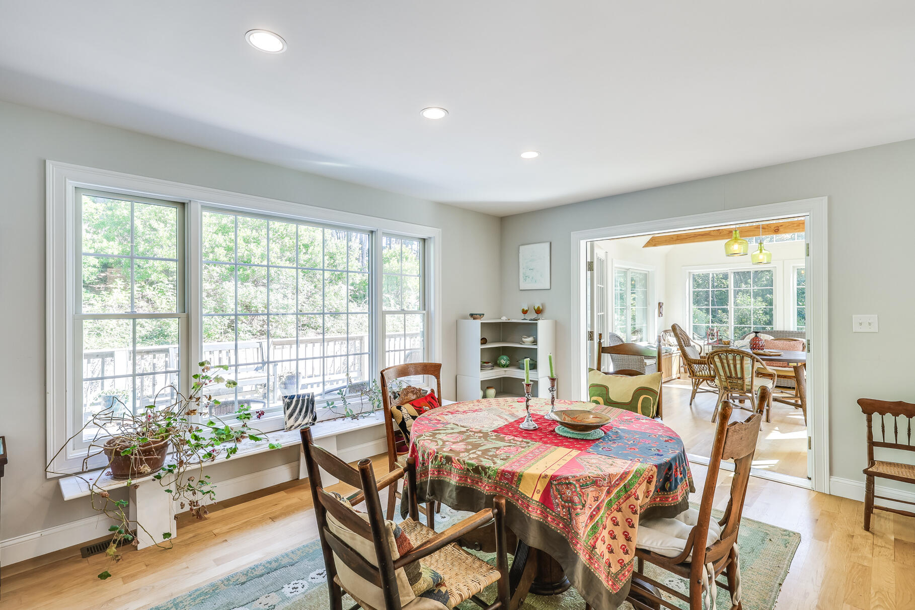 105 High Meadow Road Wellfleet, MA 02667 - Photo 29 of 52 a dining room with furniture and wooden floor