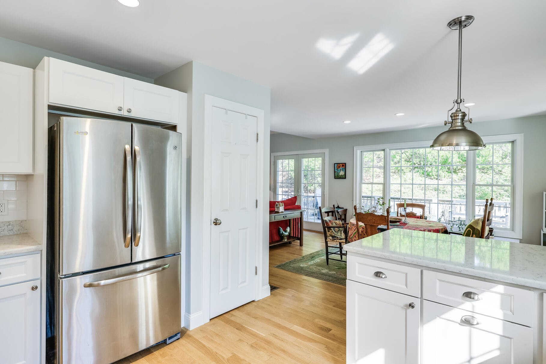 105 High Meadow Road Wellfleet, MA 02667 - Photo 37 of 52 a kitchen with stainless steel appliances granite countertop a refrigerator and a sink